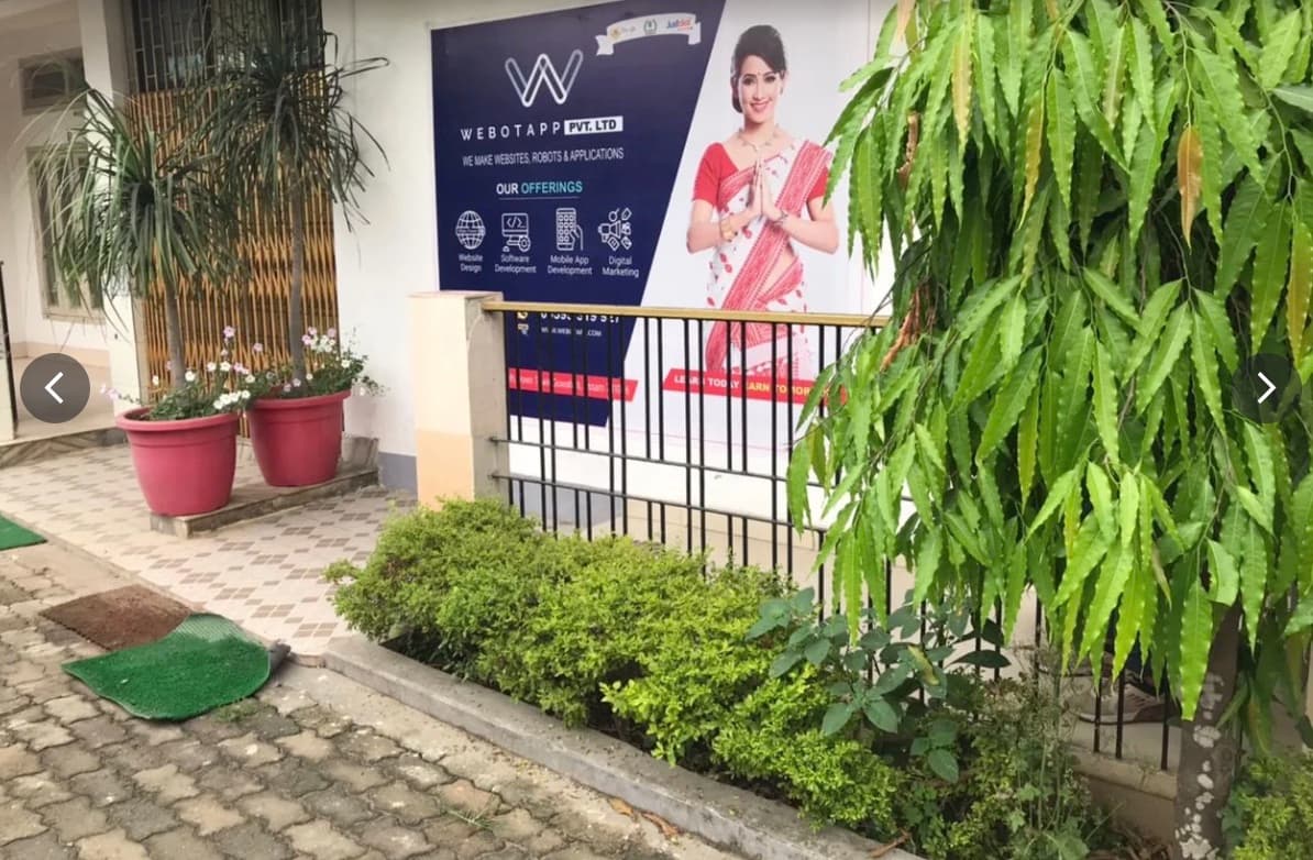 Webotapp Academy signboard outside the Sarumotoria, Guwahati office